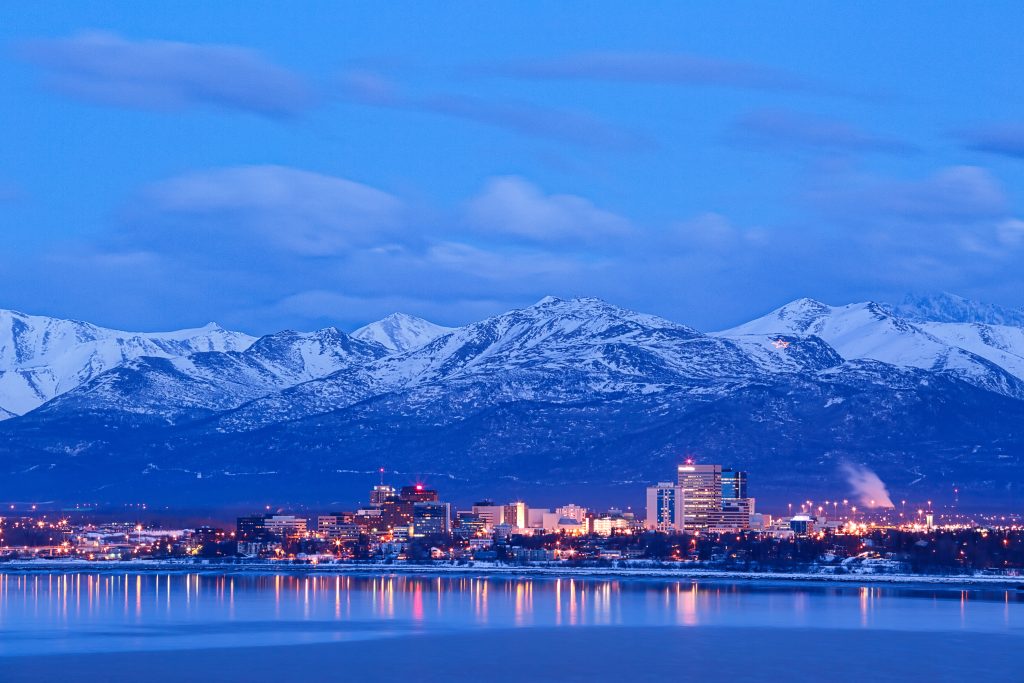 anchorage,alaska,skyline,in,winter,at,dusk,with,the,chugach